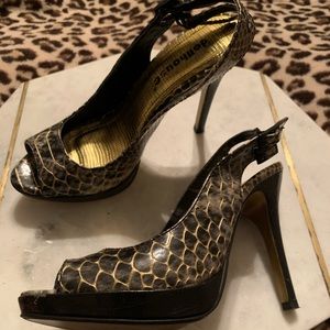 Dollhouse snake-like patter really cool heels to wear!